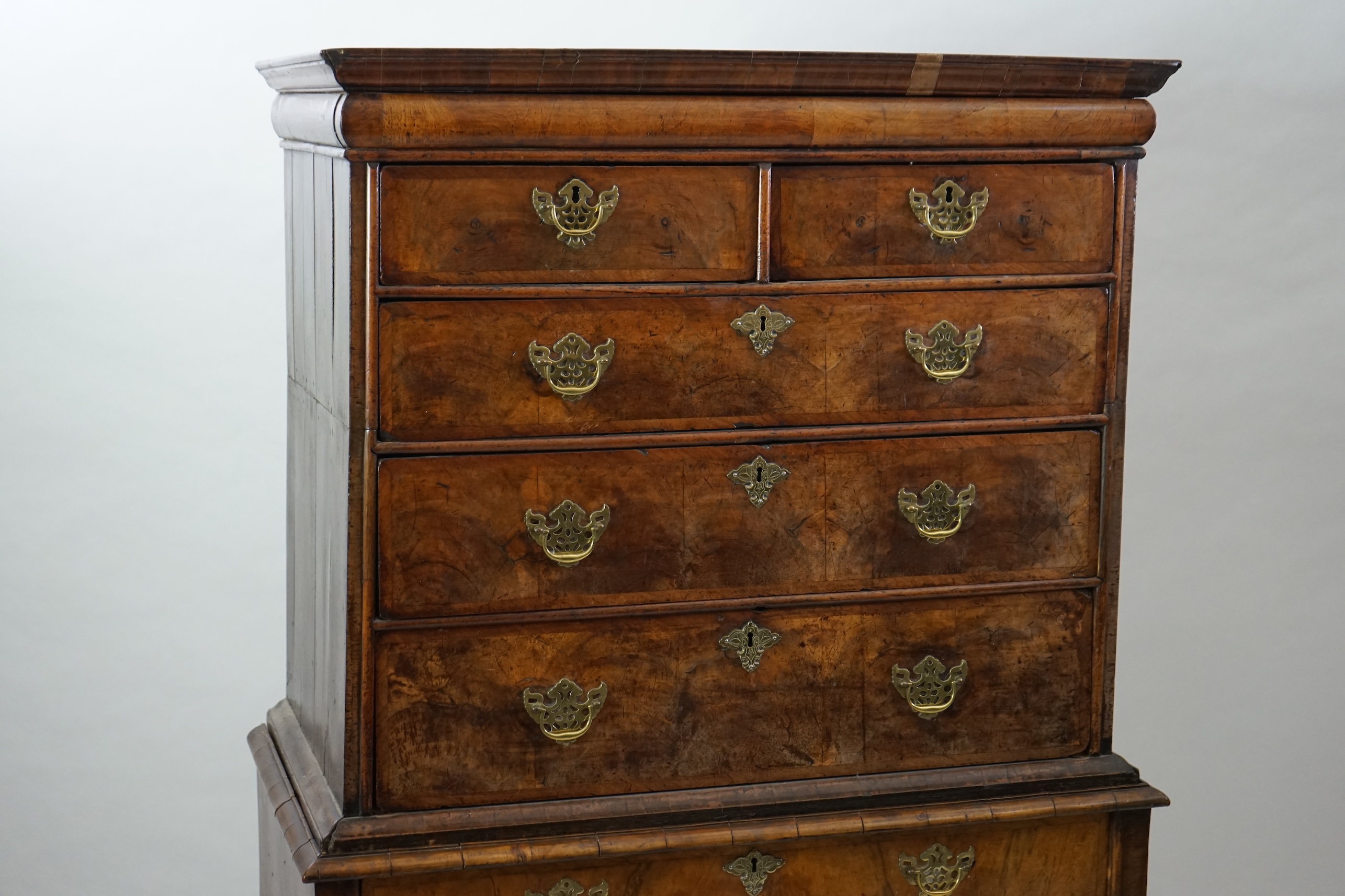 An early 18th century walnut chest on stand